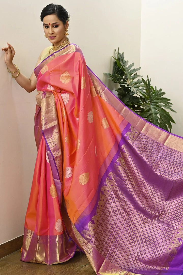 Festival Wear Pink And Orange Kanjivaram Saree With Richness Of Silver Zari