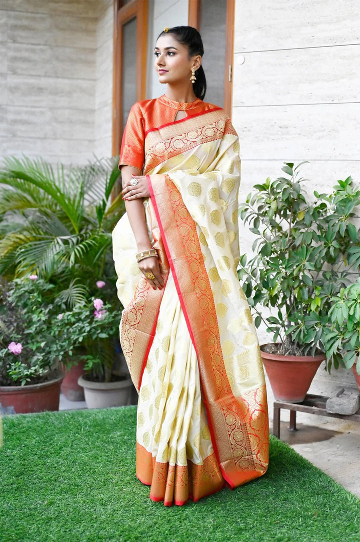 Off White Color Banarasi Saree with Zari Border and Heavy Pallu