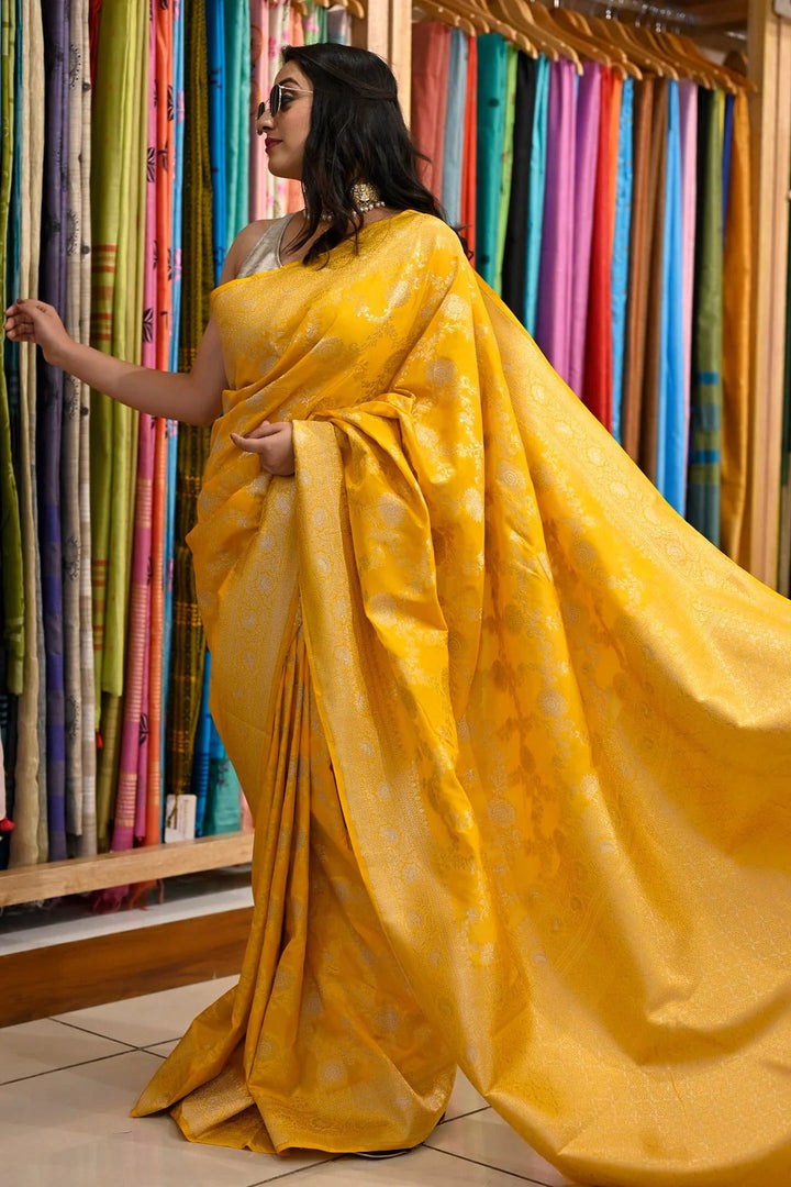 Party Wear Yellow Color Banarasi Silk Saree With Meena Work