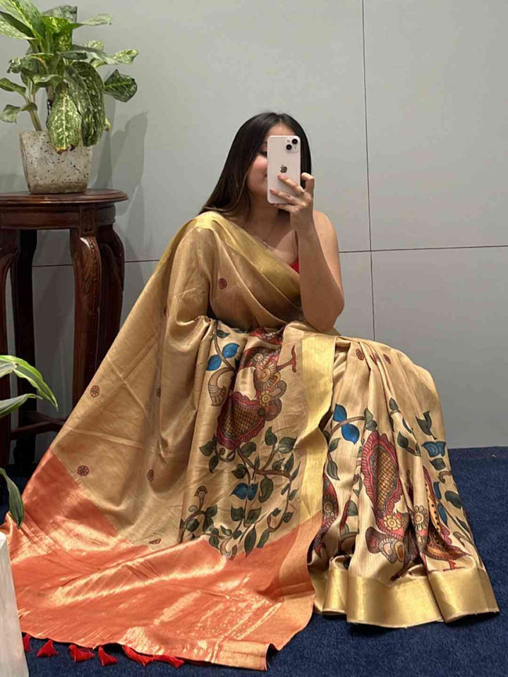 Golden Soft Silk Saree with Kalamkari Peacock Print & Contrast Orange Pallu