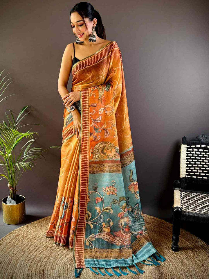 Rust Orange Soft Silk Saree with Kalamkari-Style Printed Pallu & Teal Tassels