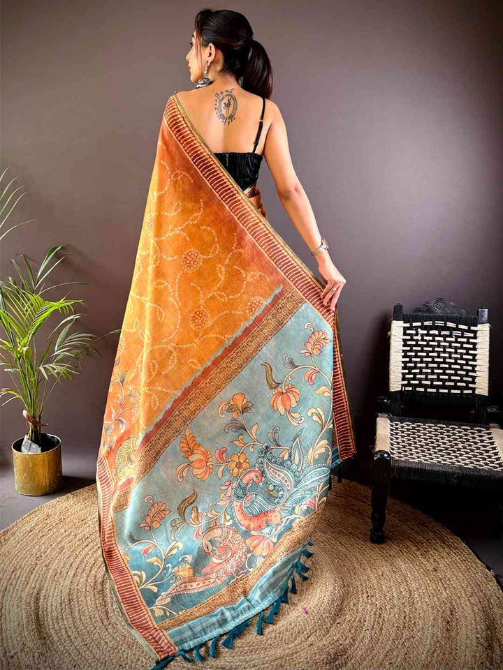 Rust Orange Soft Silk Saree with Kalamkari-Style Printed Pallu & Teal Tassels