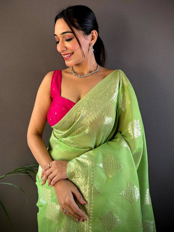 Lime Green Banarasi Soft Silk Saree with Silver Zari Motifs & Contrast Pink Tassels