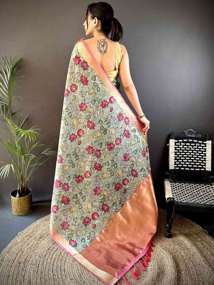 Pastel Green Floral Soft Silk Saree with Peach Zari Border