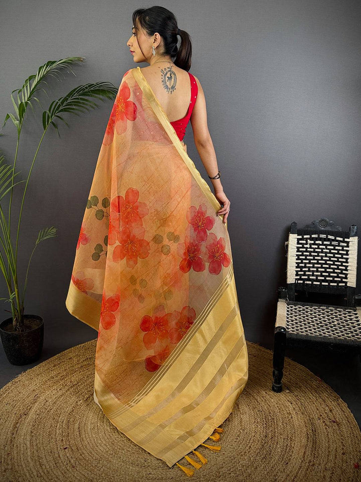 Yellow Organza Saree with Bold Red Floral Print & Golden Zari Border