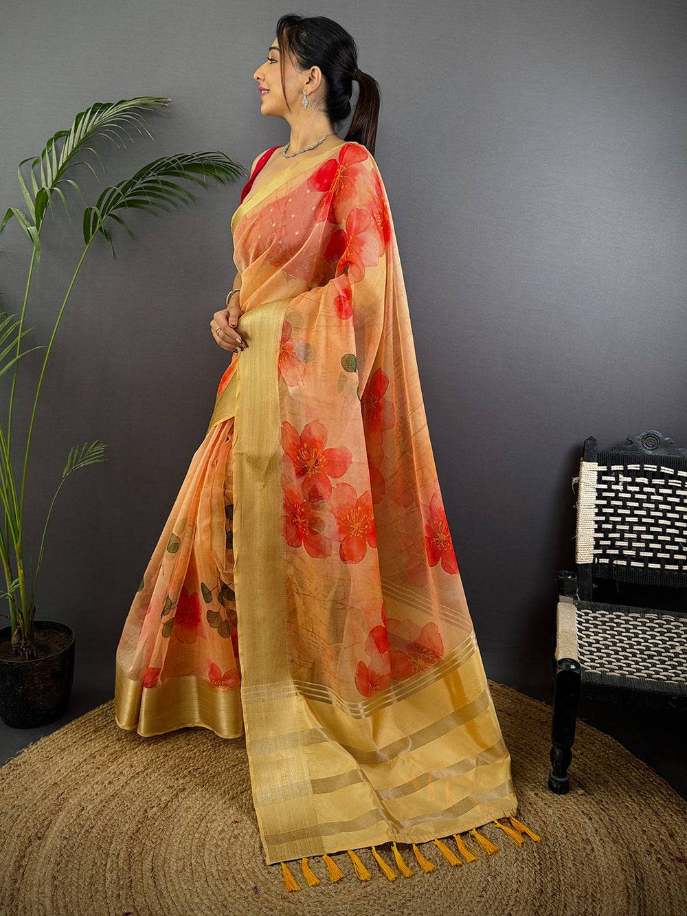 Yellow Organza Saree with Bold Red Floral Print & Golden Zari Border