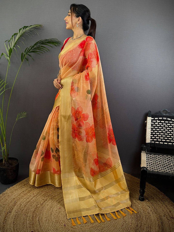 Yellow Organza Saree with Bold Red Floral Print & Golden Zari Border