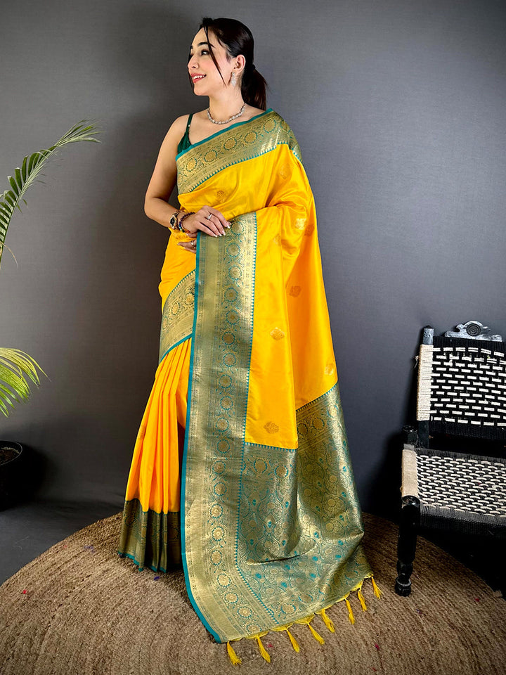 Yellow Soft Silk Saree with Teal Blue Golden Zari Border