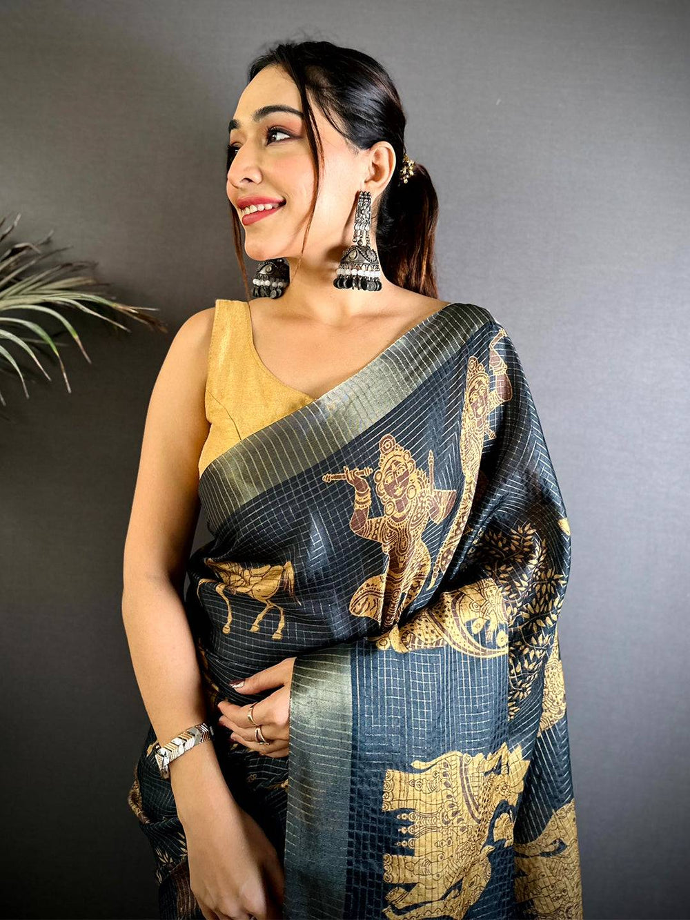 Black Soft Silk Saree with Antique Golden Tribal Motifs