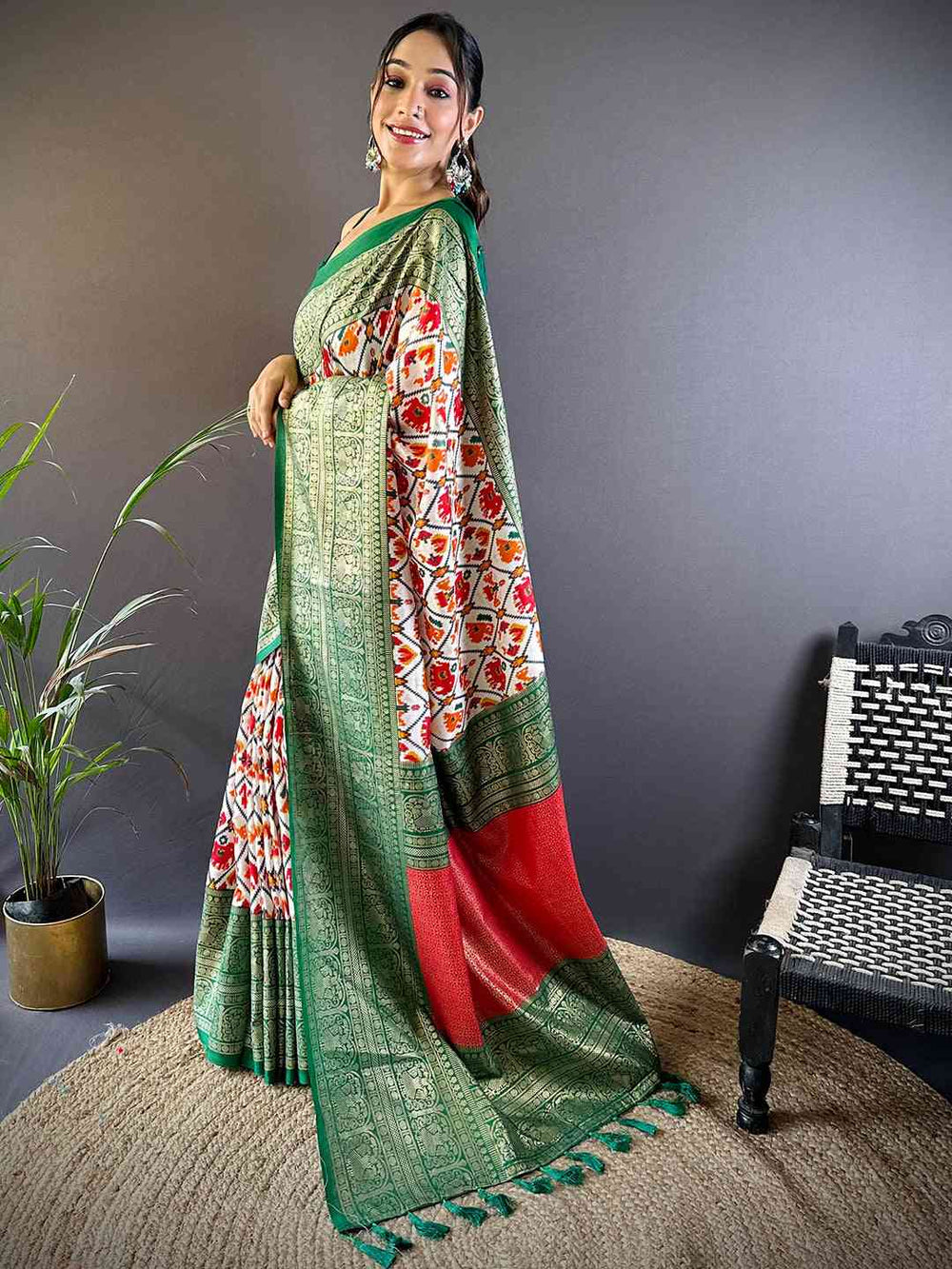 Green Patola Print Soft Silk Saree with Contrast Red Border