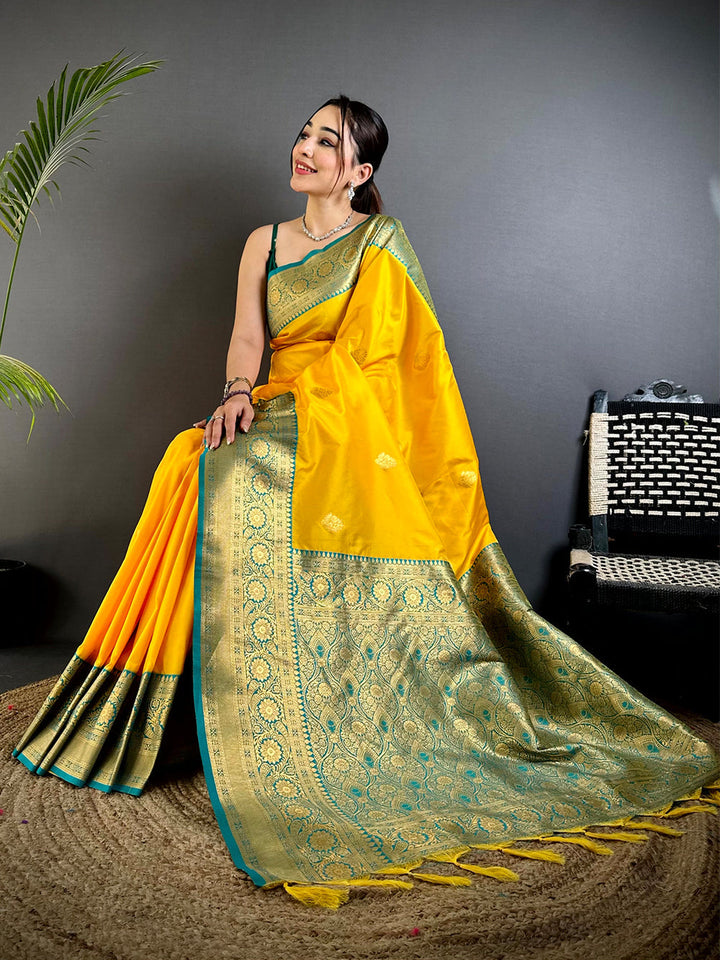 Yellow Soft Silk Saree with Teal Blue Golden Zari Border