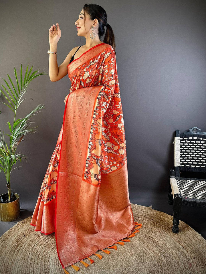 Orange Soft Silk Saree with Artistic Print & Rich Zari Border