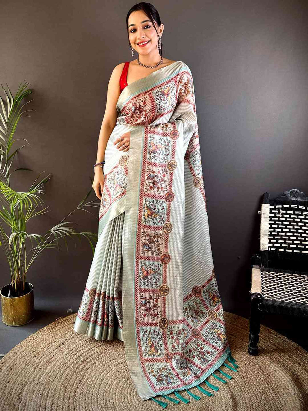 Off White Soft Silk Saree with Traditional Kalamkari Print & Contrast Teal Tassels
