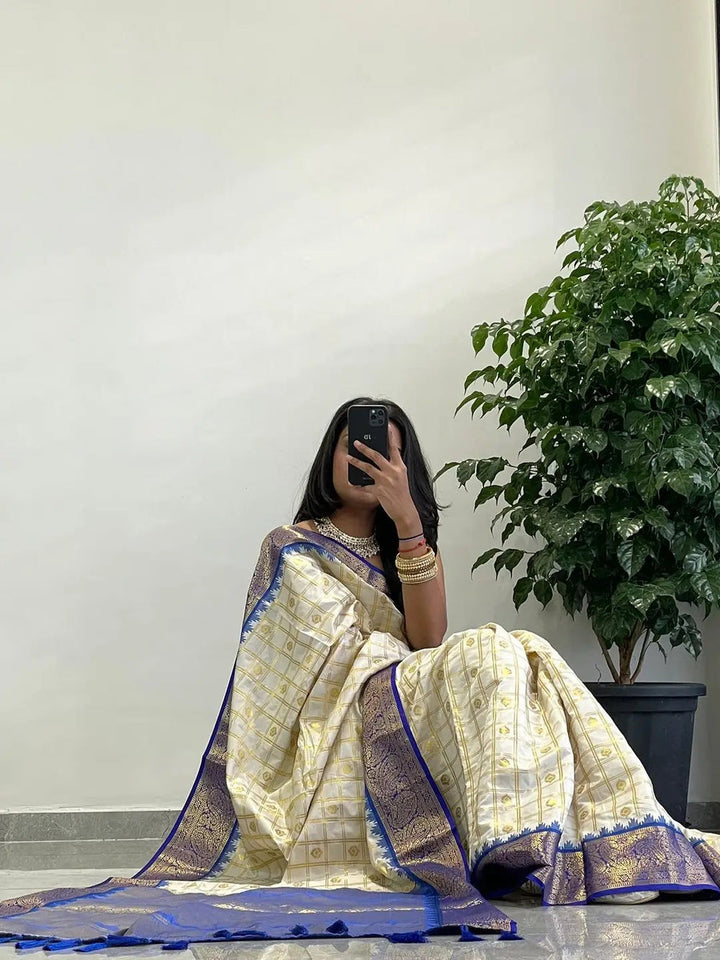 Cream Banarasi Soft Silk Saree with Gold Checks & Royal Blue Zari Border