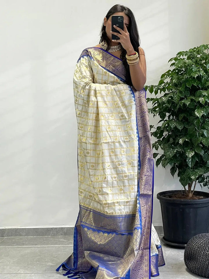 Cream Banarasi Soft Silk Saree with Gold Checks & Royal Blue Zari Border