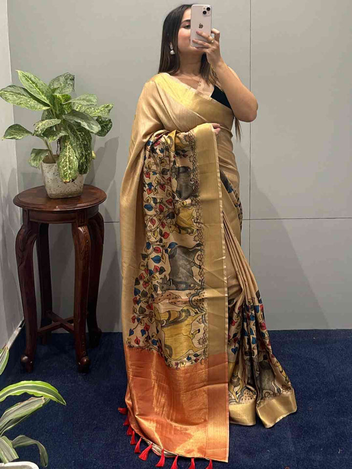 Golden Soft Silk Saree with Multicolor Madhubani Print & Orange Tassel Border