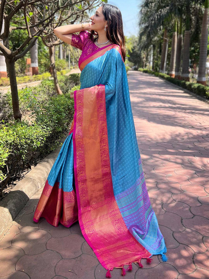 Blue Soft Silk Saree with Pink–Orange Contrast Border & Rich Zari Weaving