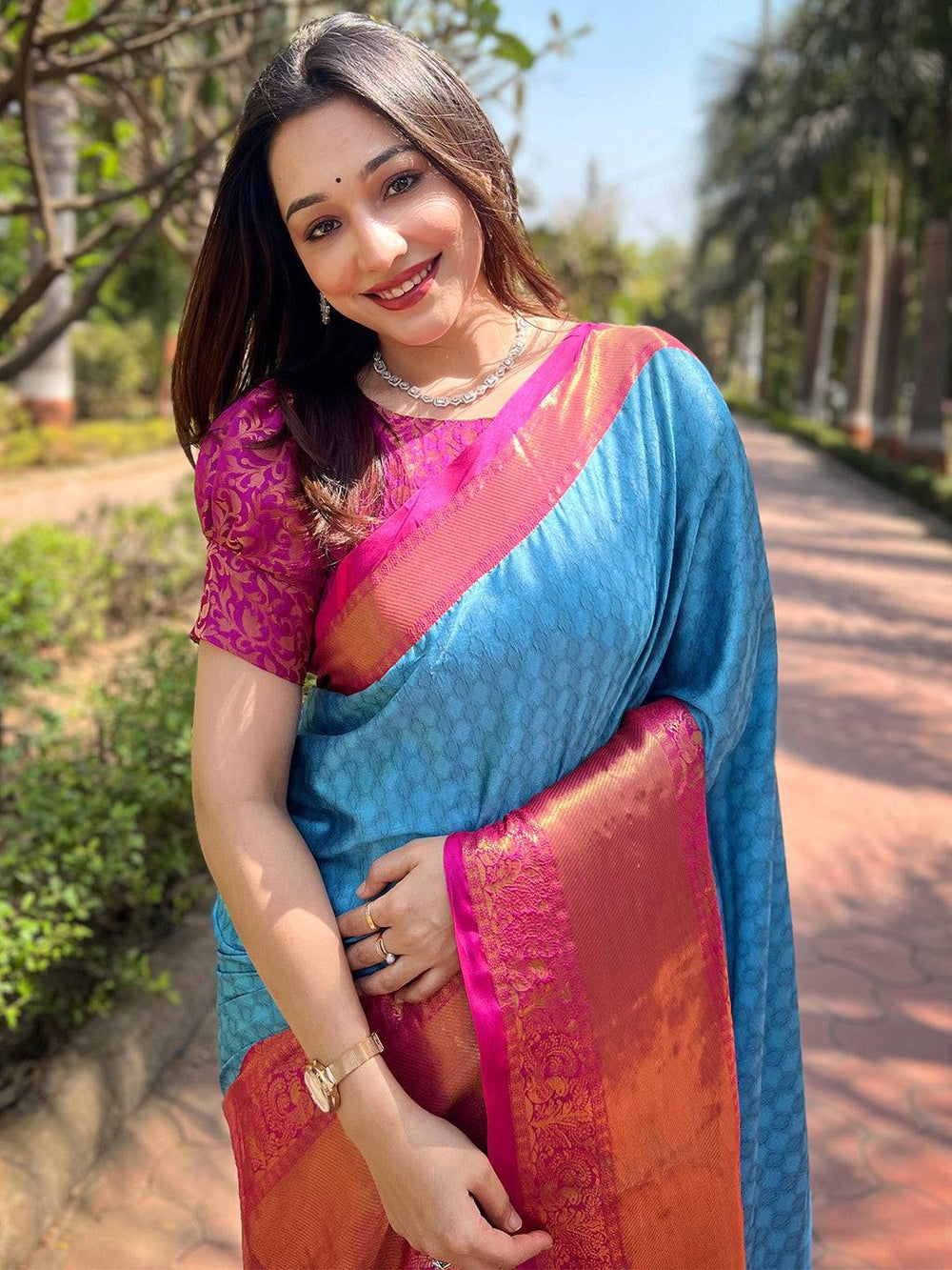Blue Soft Silk Saree with Pink–Orange Contrast Border & Rich Zari Weaving