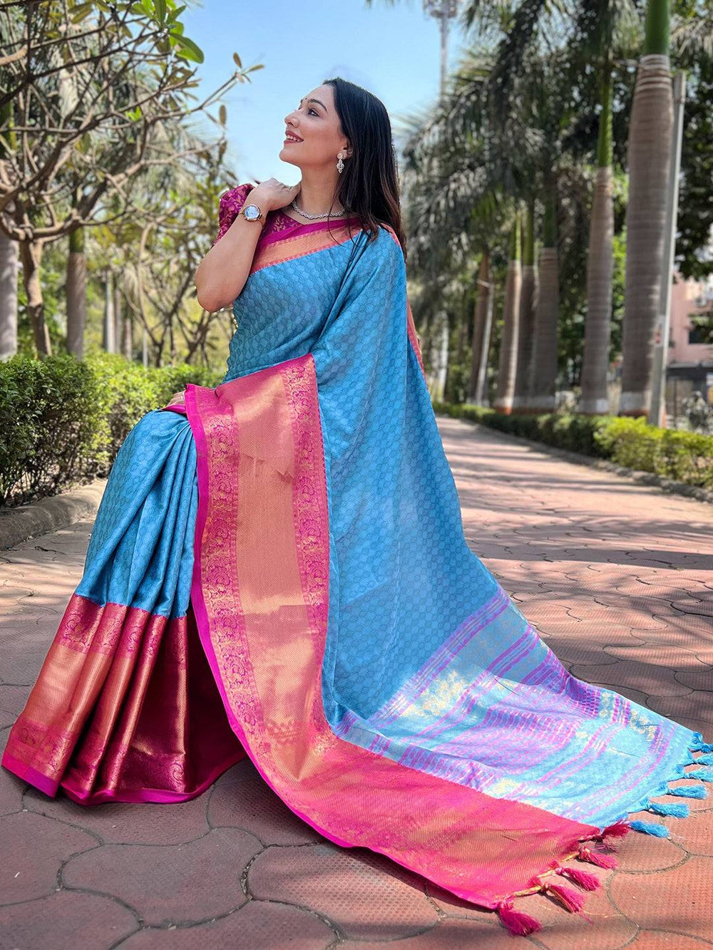 Blue Soft Silk Saree with Pink–Orange Contrast Border & Rich Zari Weaving