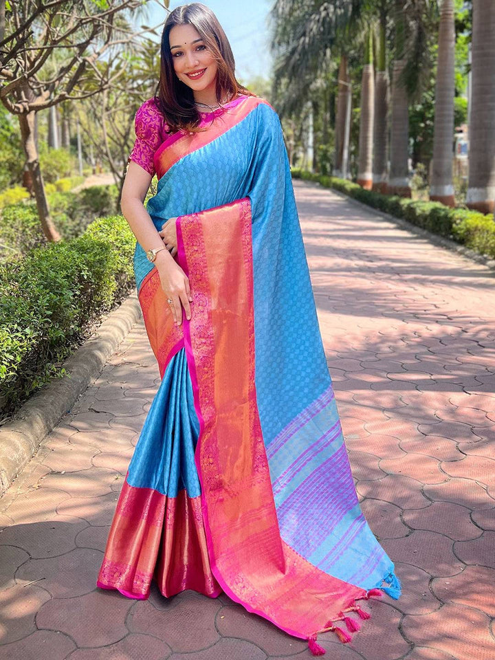 Blue Soft Silk Saree with Pink–Orange Contrast Border & Rich Zari Weaving