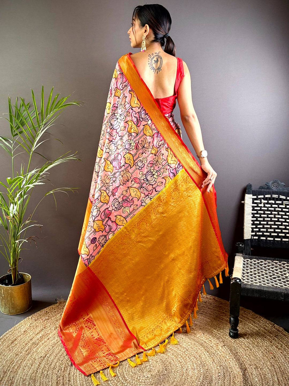 Orange Soft Silk Saree with Floral Print & Red Zari Border