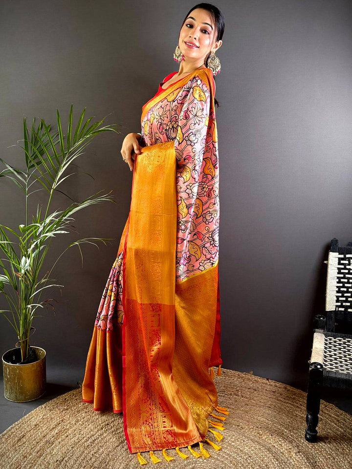 Orange Soft Silk Saree with Floral Print & Red Zari Border