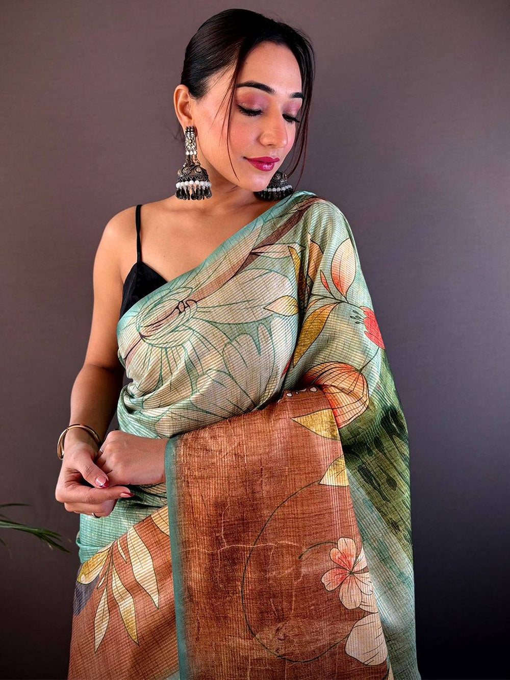 Pastel Green Linen Silk Saree with Artistic Floral Print & Copper Textured Pallu