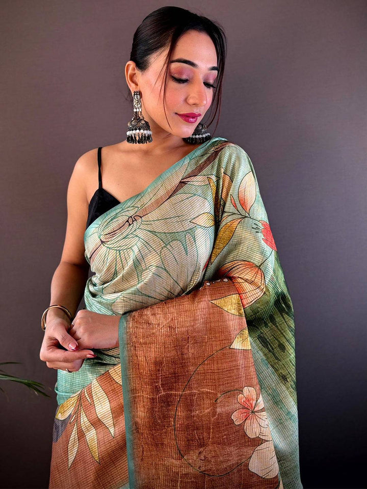 Pastel Green Linen Silk Saree with Artistic Floral Print & Copper Textured Pallu