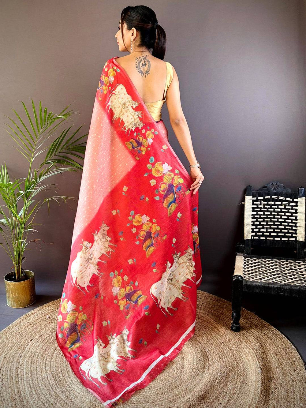 Red Linen Silk Saree with Artistic Cow Print & Floral Detailing