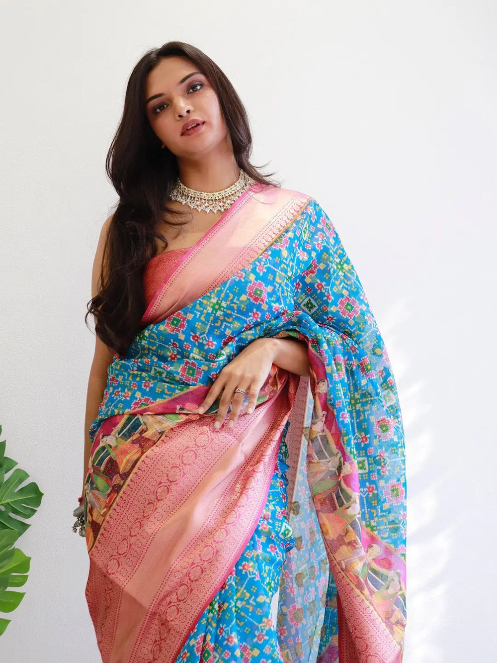 Blue Patola Print Soft Silk Saree with Peach Zari Border & Designer Pallu