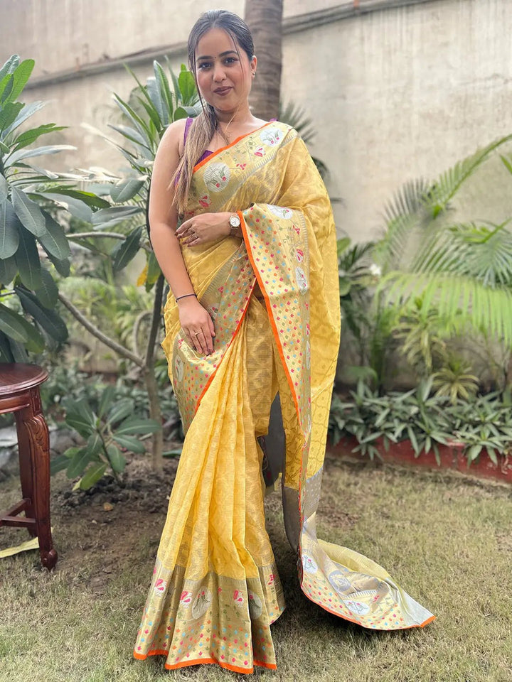 Yellow Banarasi Soft Silk Saree with Silver Zari Weaving & Multicolor Motifs