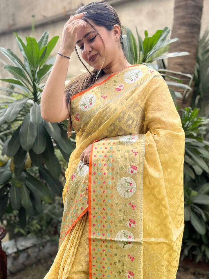Yellow Banarasi Soft Silk Saree with Silver Zari Weaving & Multicolor Motifs