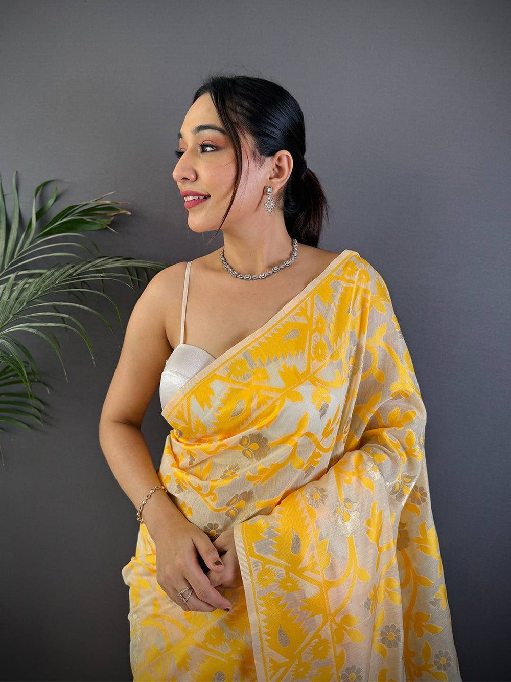 Yellow Linen Saree with Silver Zari Floral Weaving