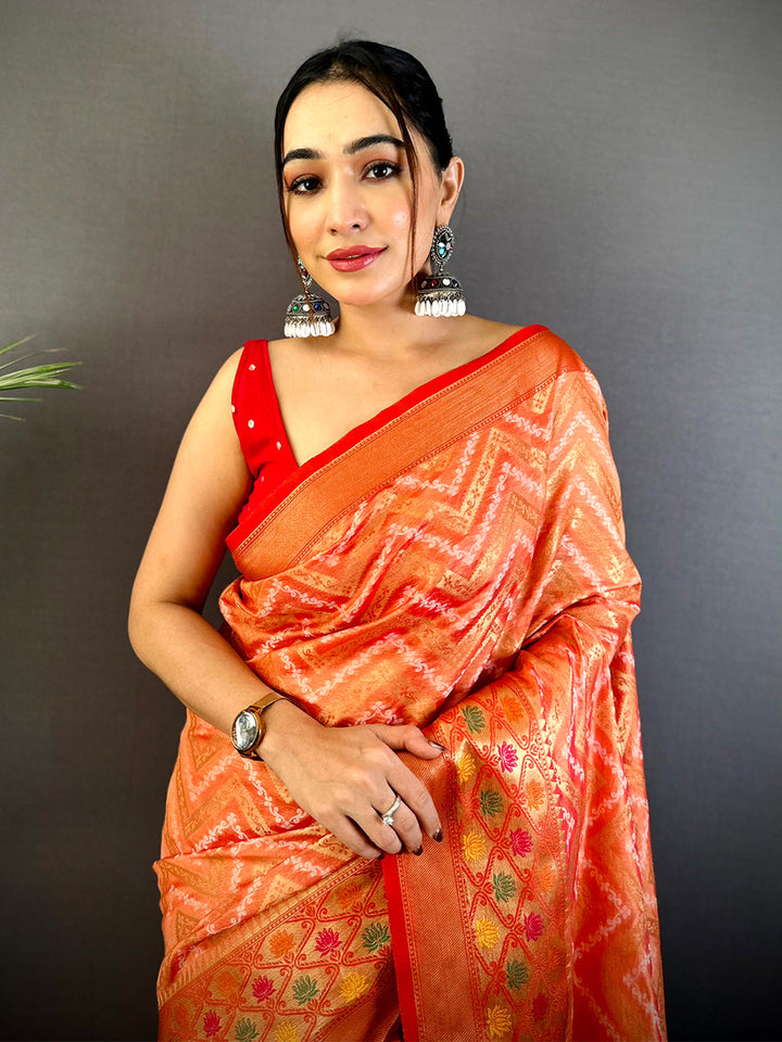 Orange Soft Silk Saree with Zigzag Weave & Red Zari Border