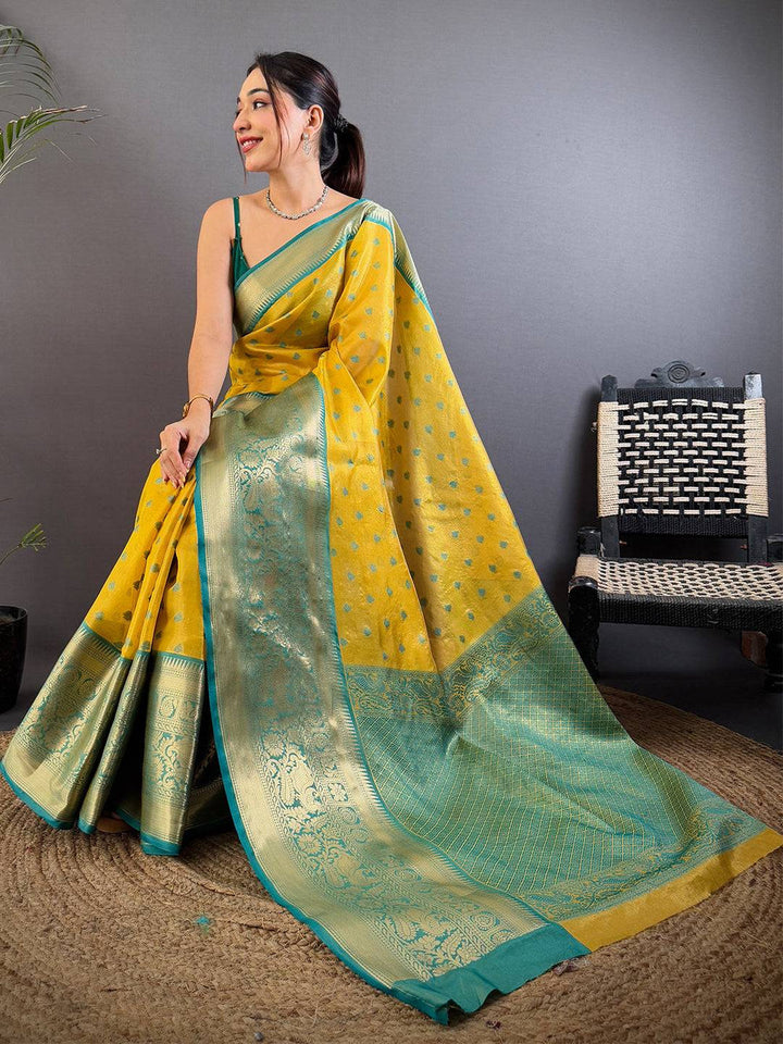 Yellow Soft Silk Saree with Teal Green Zari Border & Butta Work