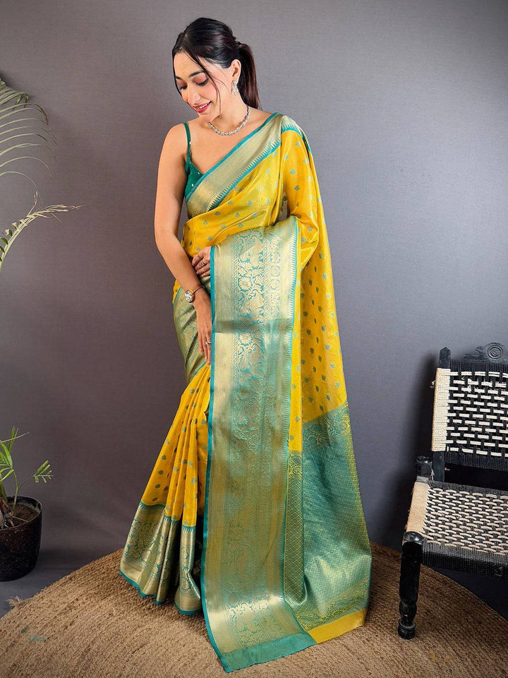 Yellow Soft Silk Saree with Teal Green Zari Border & Butta Work