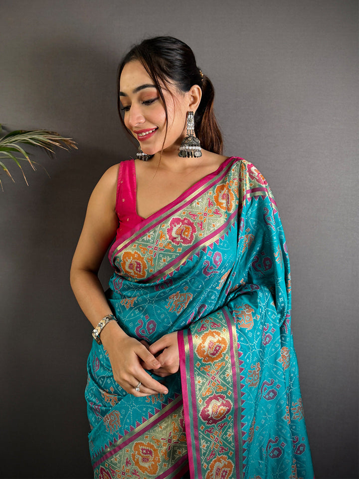 Teal Blue Patola Print Soft Silk Saree with Pink Zari Border