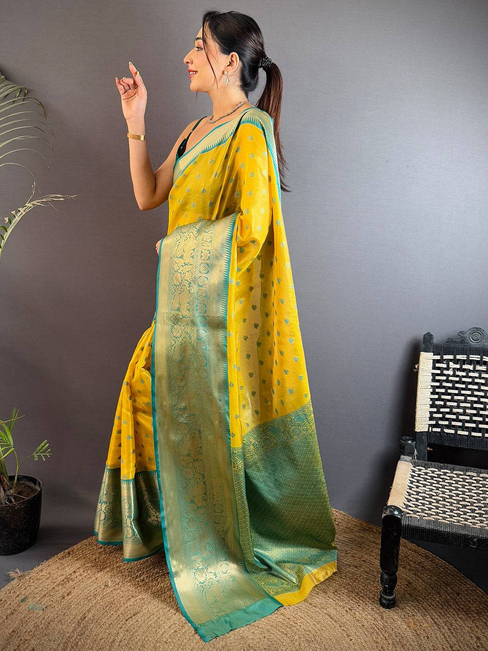 Yellow Soft Silk Saree with Teal Green Zari Border & Butta Work