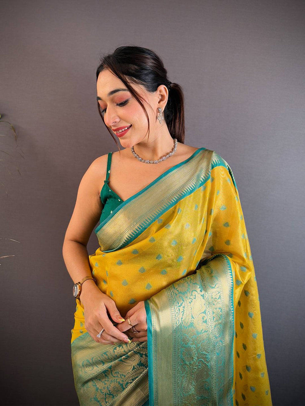 Yellow Soft Silk Saree with Teal Green Zari Border & Butta Work