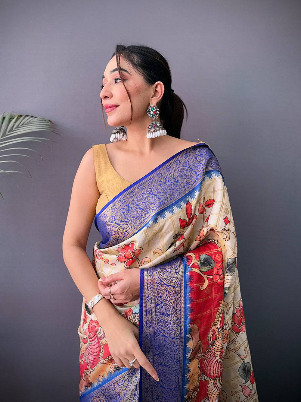 Cream & Red Soft Silk Saree with Blue Zari Border and Artistic Floral Print