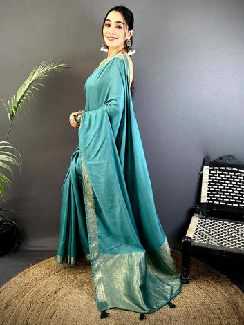 Teal Green Banarasi Silk Saree with Silver Zari Border & Rich Woven Pallu