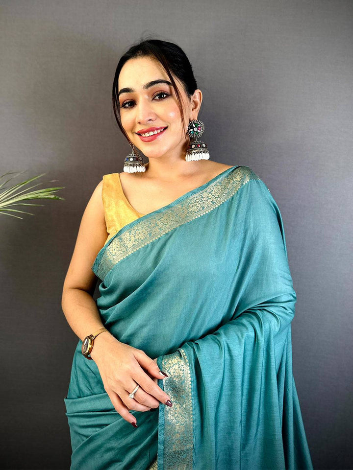 Teal Green Banarasi Silk Saree with Silver Zari Border & Rich Woven Pallu