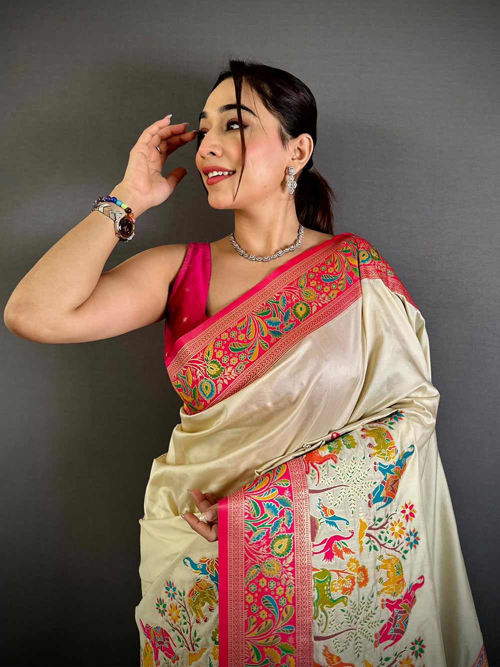Ivory Ethnic Print Silk Saree with Vibrant Multicolor Pallu & Tassels