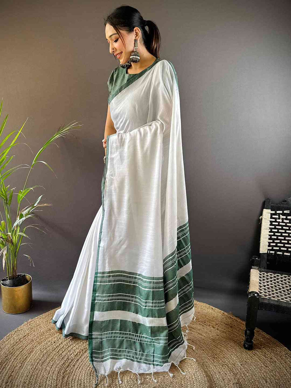 White Soft Cotton Saree with Green Woven Border & Tassel Pallu