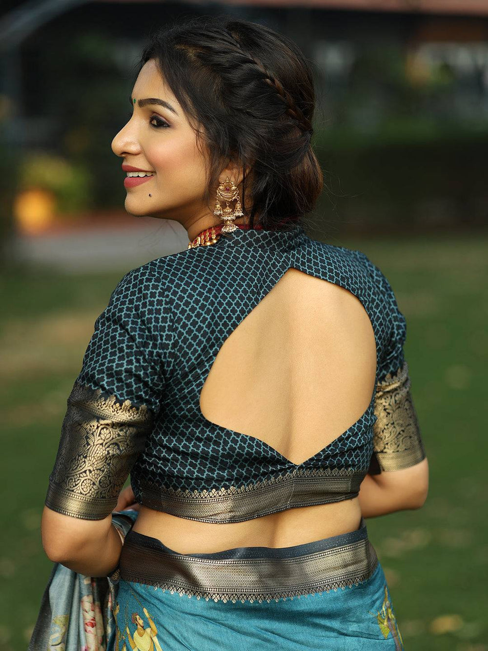 Teal Floral Printed Kanjivaram Silk Saree with Rich Black Zari Border & Pallu
