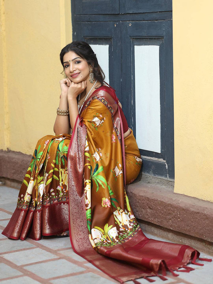 Mustard Printed Kanjivaram Silk Saree with Maroon Zari Border & Traditional Cow Motifs
