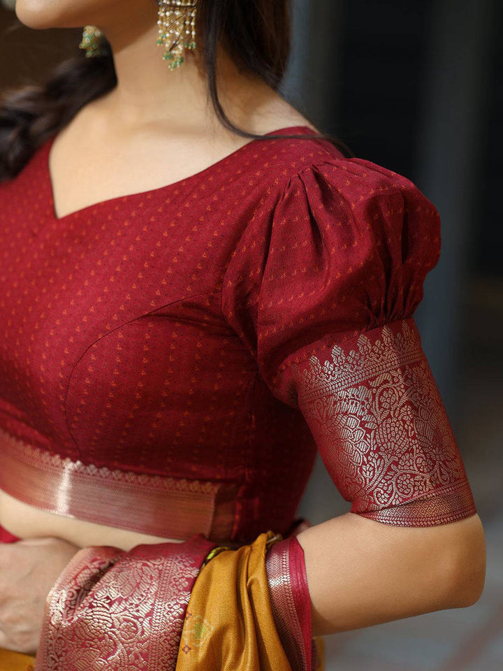 Mustard Printed Kanjivaram Silk Saree with Maroon Zari Border & Traditional Cow Motifs