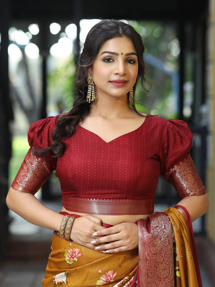 Mustard Printed Kanjivaram Silk Saree with Maroon Zari Border & Traditional Cow Motifs