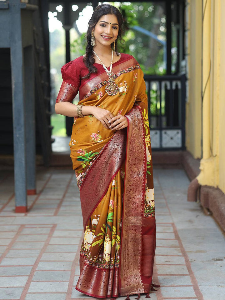 Mustard Printed Kanjivaram Silk Saree with Maroon Zari Border & Traditional Cow Motifs