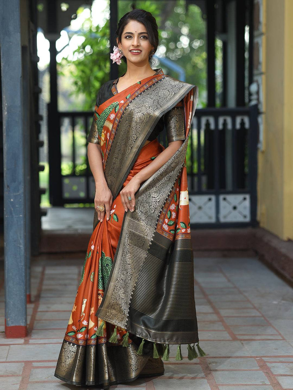 Rust Printed Kanjivaram Silk Saree with Black Zari Border & Traditional Motifs
